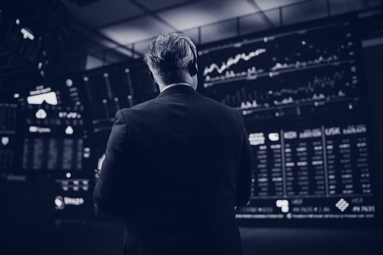 Back,View,Of,A,Middle,Aged,Stock,Exchange,Trader,Following